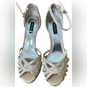 White House Black Market Bone Colored Strappy Sandals w/ Corkscrew Heel Detail.